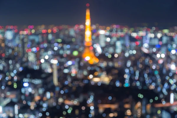 Abstraktní bokeh rozmazané světla, letecký pohled na twilight Tokyo city — Stock fotografie