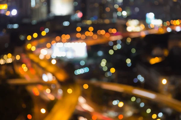 Areal view freeway intersection night, abstract blurred bokeh