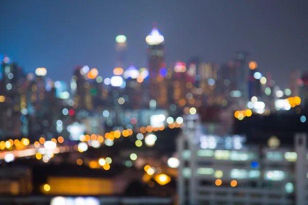 Desfocado bokeh luzes da cidade do centro — Fotografia de Stock