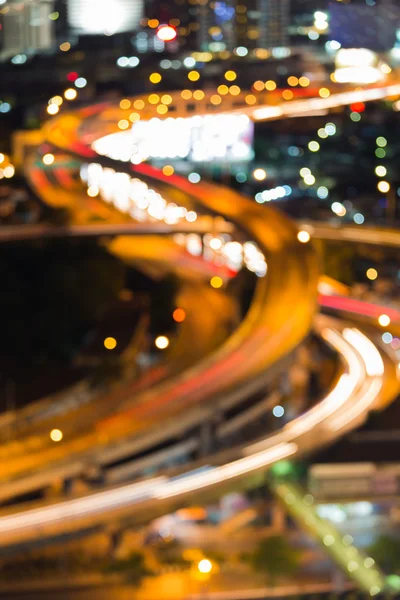 Suddig bokeh ljus, stängt upp highway korsning — Stockfoto