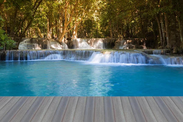 Opening wooden floor, Tropical waterfalls in deep forest national park