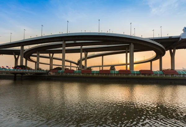 Round interconnection river front with sunset sky — Stock Photo, Image