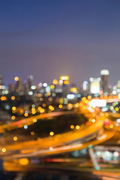 Verschwommene Bokeh-Lichter, Kreuzung Autobahn und Innenstadt Hintergrund — Stockfoto