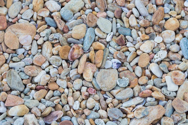 Галечный камень фон, природный круглый морской камень — стоковое фото
