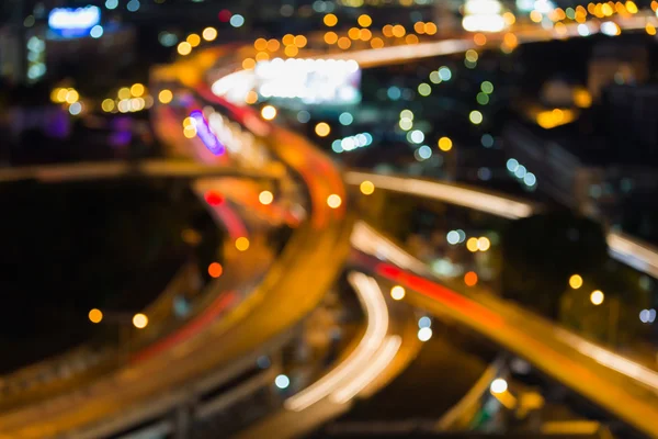 Suddig lampor på nära håll motorväg korsningen bokeh nattvisning — Stockfoto