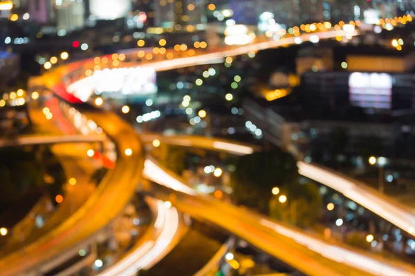 空撮ぼやけてライト ボケ都市の道路の交差点、夜景 — ストック写真