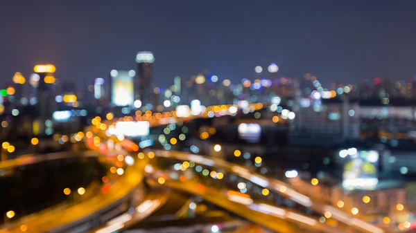 Blurred bokeh light city and highway — Stock Photo, Image