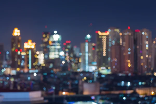 Розмите світло місто освітлює барвистий фон — стокове фото