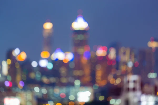 Blurred multiple colour lights night view, city office building background — Stock Photo, Image