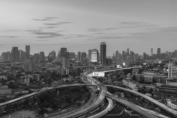 Black and White, City downtown background over highway interchanged