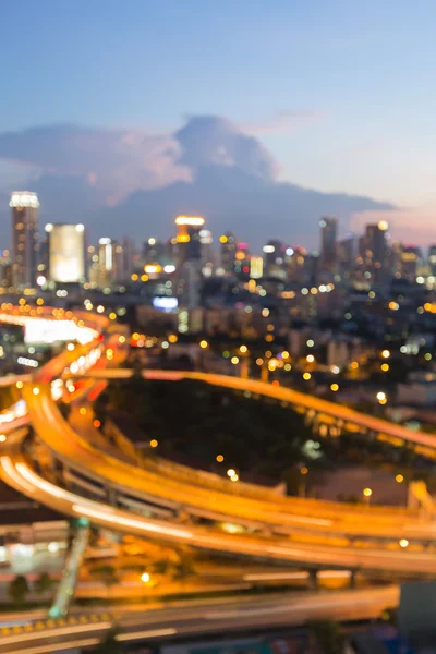 Abstrato borrado bokeh luzes cidade centro de visão noturna — Fotografia de Stock