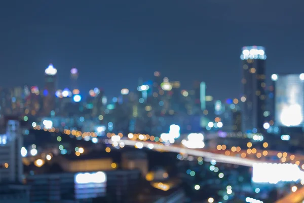 Crepúsculo, luces borrosas ciudad centro —  Fotos de Stock