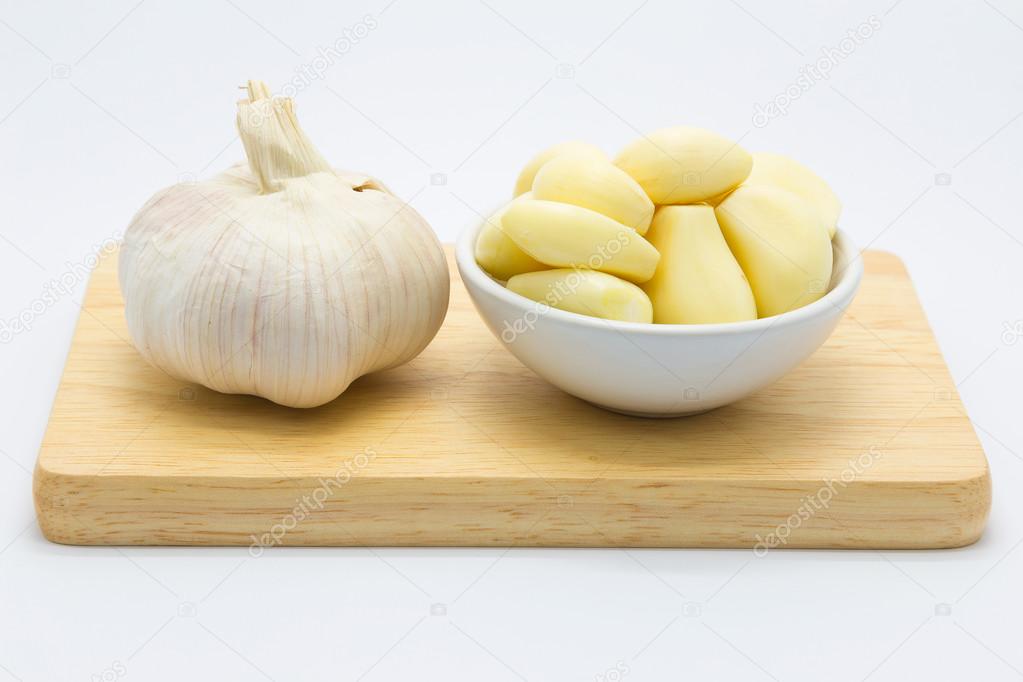 Fresh garlic on wooden board