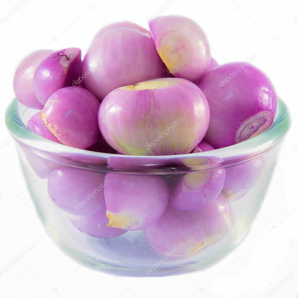 Fresh red onions on Glass