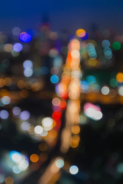 Abstraktní rozostření bokeh město silnice v noci — Stock fotografie