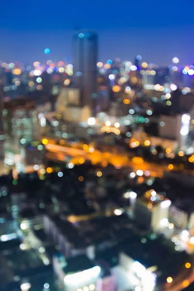 Bokeh luces de la ciudad borrosa efecto de fondo durante el crepúsculo —  Fotos de Stock