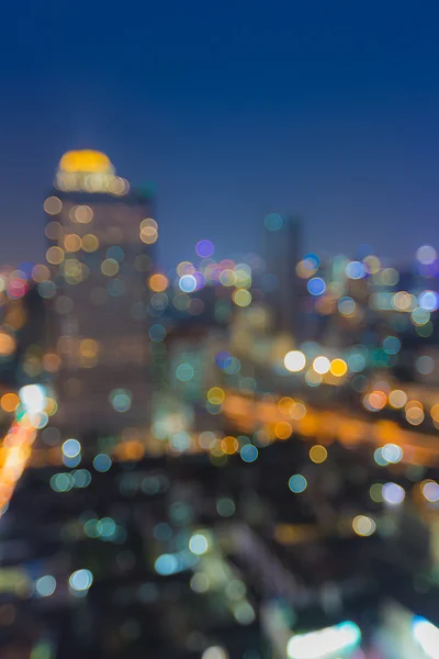 Fuera de foco, la ciudad moderna bokeh luces vista nocturna —  Fotos de Stock