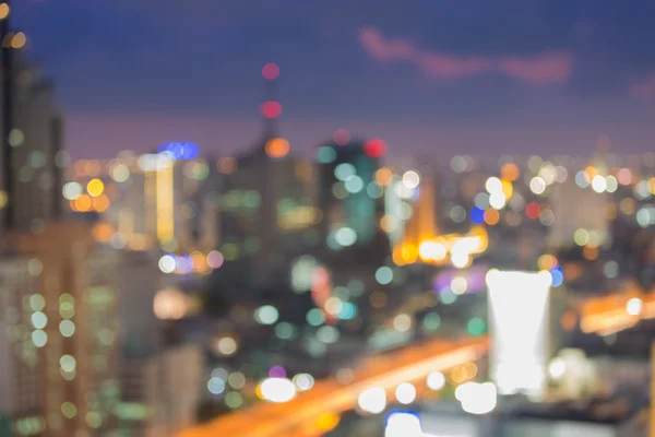 Office building night lights blurred bokeh background — Stock Photo, Image