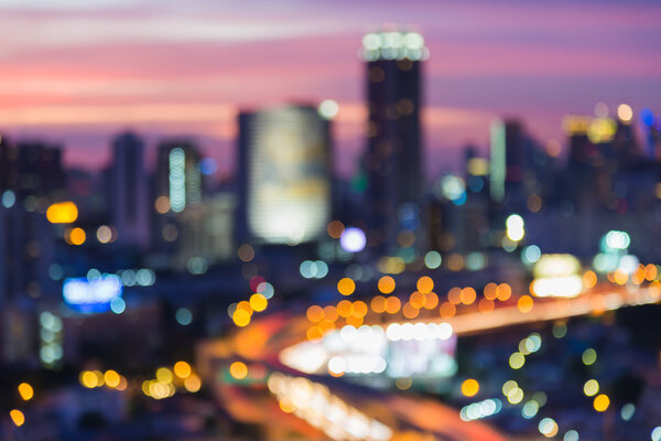 Abstract blur bokeh cityscape night lights during twilight time, Bangkok Thailand