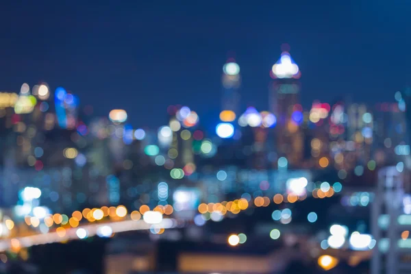 Bulanıklık bokeh güzel cityscape gece ışıkları göster — Stok fotoğraf