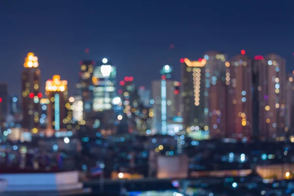 Абстрактний розмитий краєвид міста під час сутінків — стокове фото