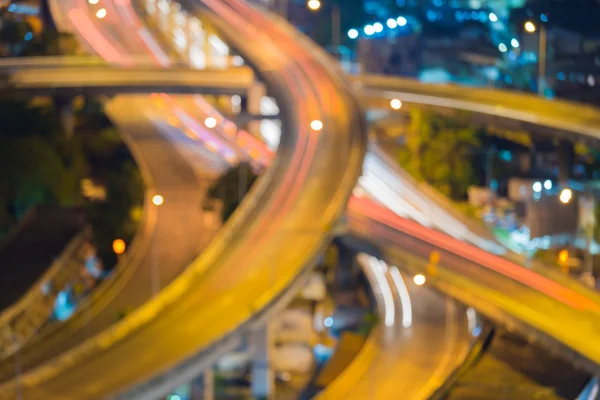 Staden motortrafikleder lampor natt bakgrund — Stockfoto