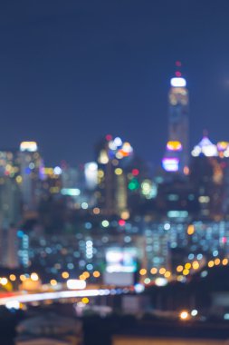 Outof focus shimmering lights night city background during twilight