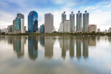 Cityscape at Bangkok Business District  twilight with water reflection Thailand