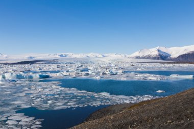Icebergs drifting to sea in Jokulsarlon Iceland