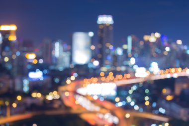 Abstract blur bokeh lights big city highway during blur hour