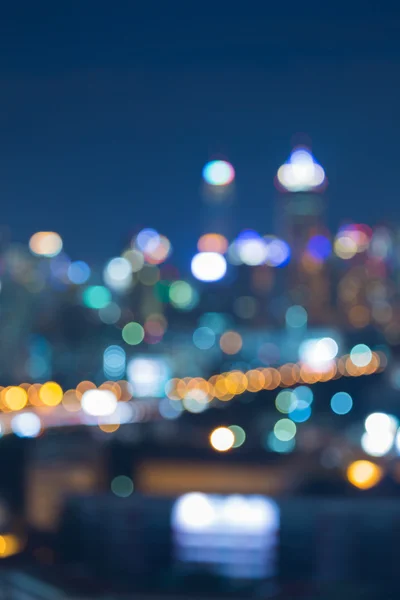 Cityscape skyline bokeh lights during twilight — Stok fotoğraf