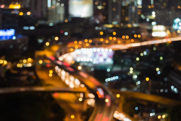 Sfocatura bokeh luci movimento della città della superstrada traffice di notte — Foto Stock