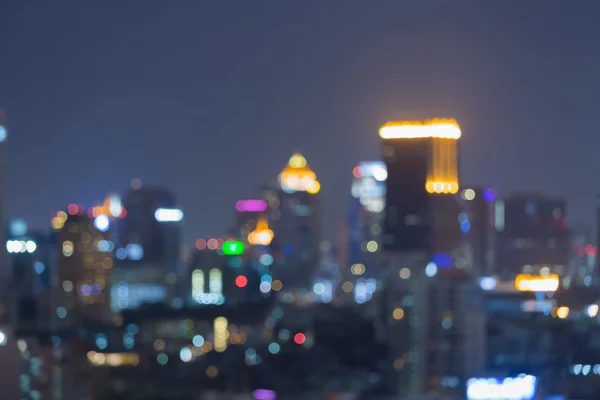 Rozmazané bokeh panorama města světla noční pohled — Stock fotografie