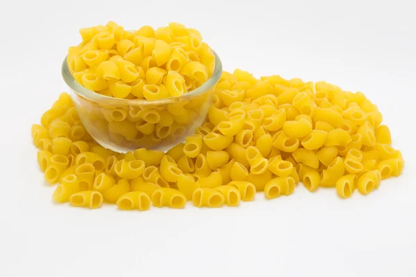 Glazen kom van Raw macaroni pasta — Stockfoto