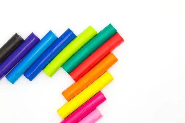 Rainbow colour art modelling clay sticks on white — Stock Photo, Image