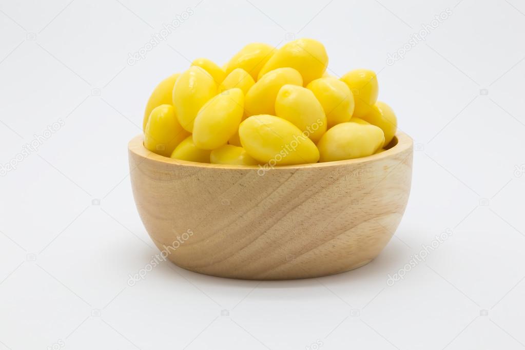 Ginkgo nuts Ginkgo biloba in wooden bowl