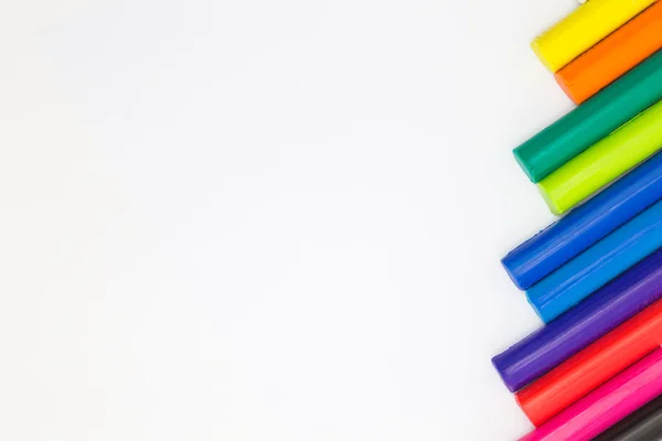 Set of rainbow colors clay sticks on white background — Stock Photo, Image