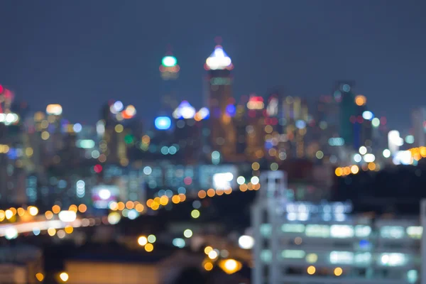 Abstract blurred bokeh lights of city at night — Stock Photo, Image