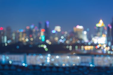 Gece, soyut bulanık bokeh arka plan ışık şehir