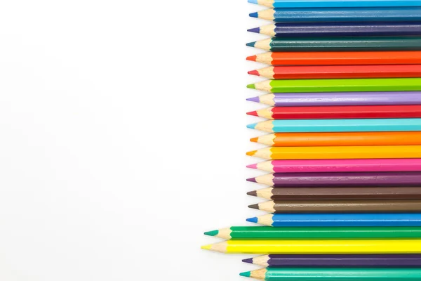 Crayon en bois multicolore sur blanc — Photo