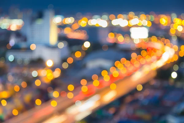 Abstrakt suddiga bokeh av Bangkok city highway böjd under twilight — Stockfoto