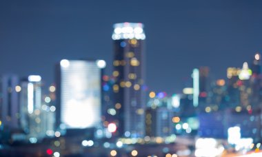 Night view of blurred cityscape lights clipart