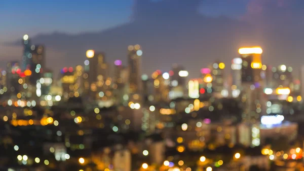 Defocused city downtown light during twilight — Stock Photo, Image