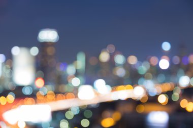 Aerial view of downtown light at night, abstract blurred bokeh background clipart