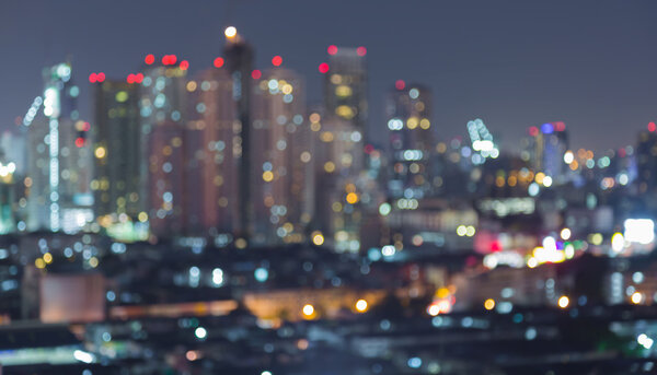 Aerial view of city light at night, abstract blurred bokeh background