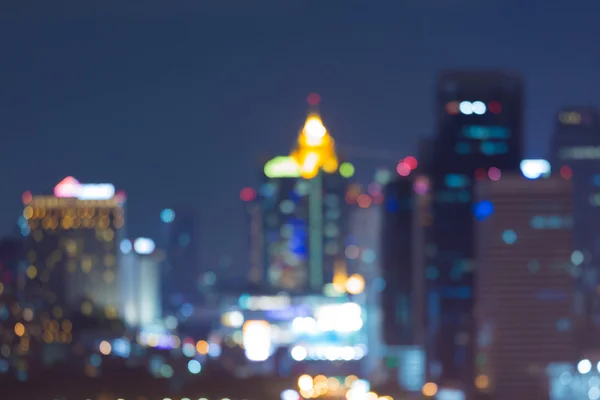 Abstract blurred bokeh lights night view of city downtown — Stock Photo, Image