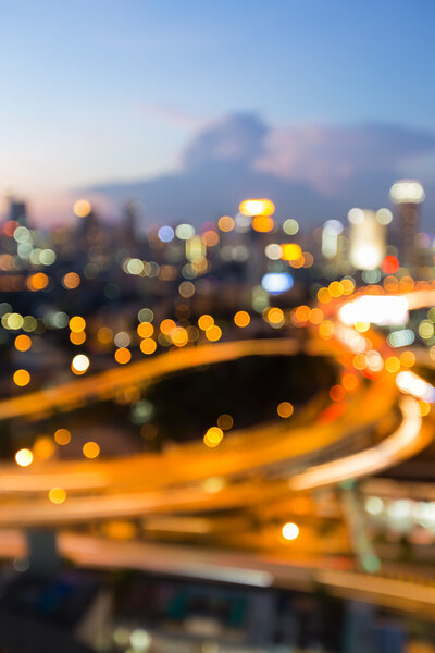 Abstract blurred bokeh city lights during twilight