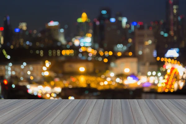 Ciudad desenfocada luces del centro por la noche — Foto de Stock