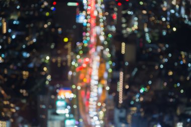 Bulanık bokeh şehir meşgul saat trafik ışıkları