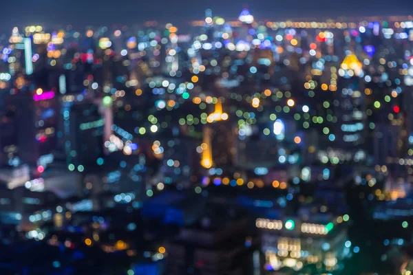 Aerial view city downtown blurred bokeh lights — Stock Photo, Image